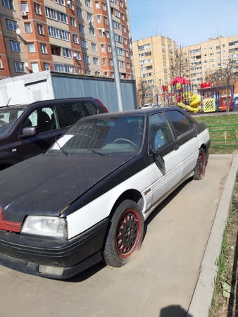 Перемещение автомобиля марки «Альфа Ромео» черного цвета на улице Новая Лесная в Нахабино.